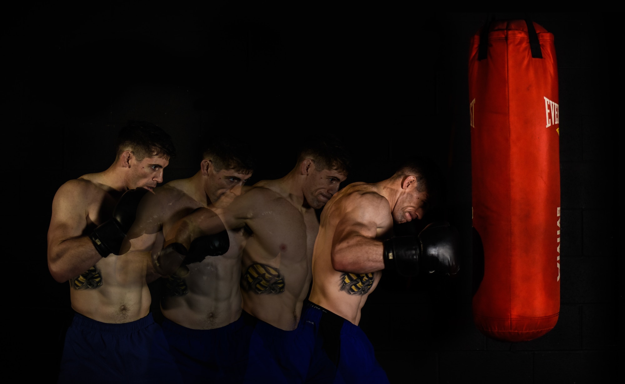 U.S. Air Force Staff Sgt. Tyler McGuire, 66th Training Squadron Survival Evasion Resistance Escape specialist, poses for a photo in Spokane Valley, Washington, Oct. 30, 2018. McGuire is preparing for his first Mixed Martial Arts world title match in Indonesia Nov. 17, and is currently undefeated with 11 wins. To stay in fighting shape, McGuire trains six days a week, for seven to nine weeks, doing physical conditioning and hand-to-hand combat training. (U.S. Air Force illustration/Airman 1st Class Jesenia Landaverde)