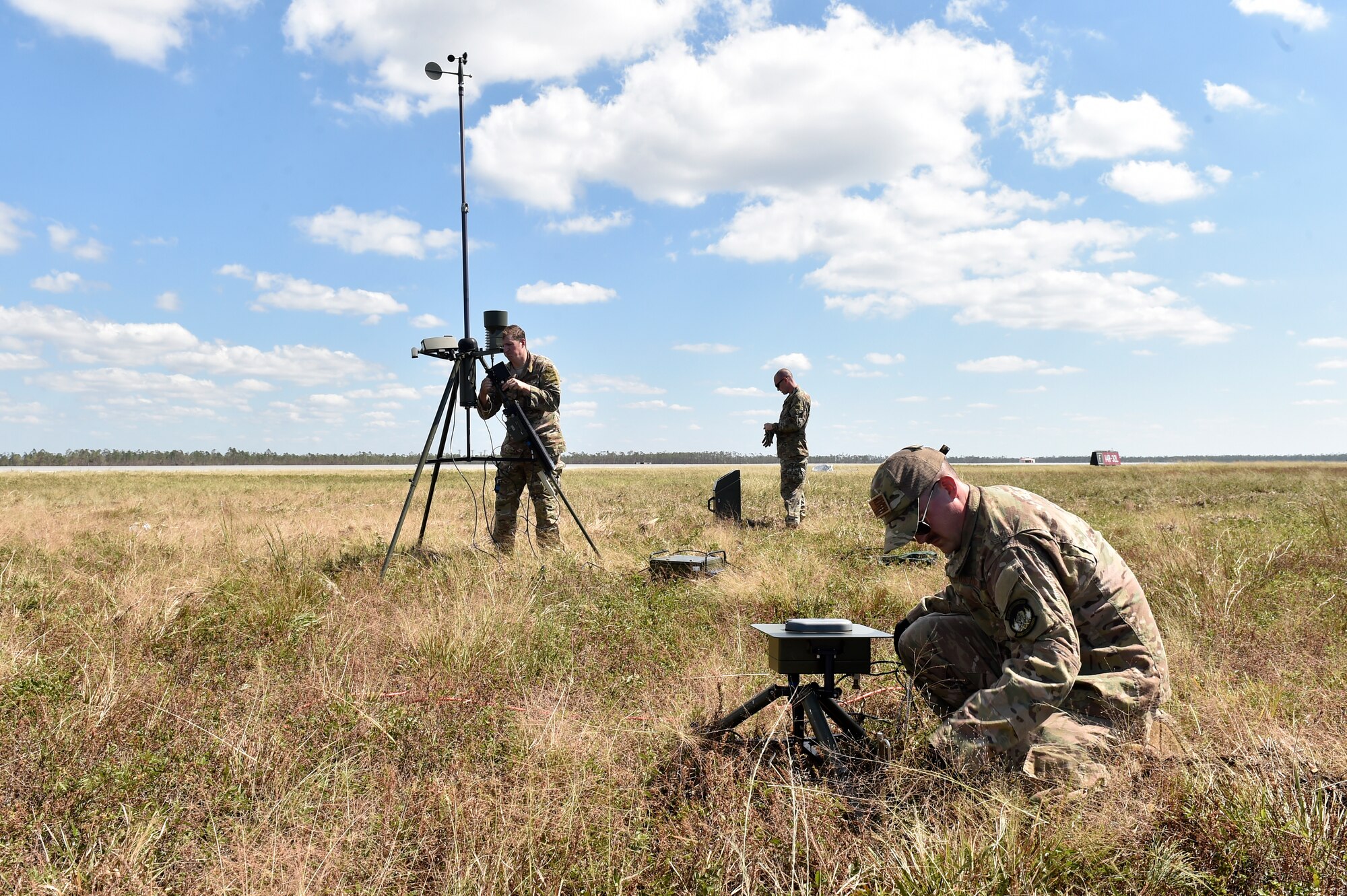 Weather personnel from the 821st Contingency Response Group and 2nd Combat Weather Systems Squadron set up a tactical meteorological observation system, Oct. 14, 2018, at Tyndall Air Force Base, Florida, in the aftermath of Hurricane Michael. The hurricane ripped through the base and the surrounding area causing severe damage. (U.S. Air Force photo by Tech. Sgt. Liliana Moreno)