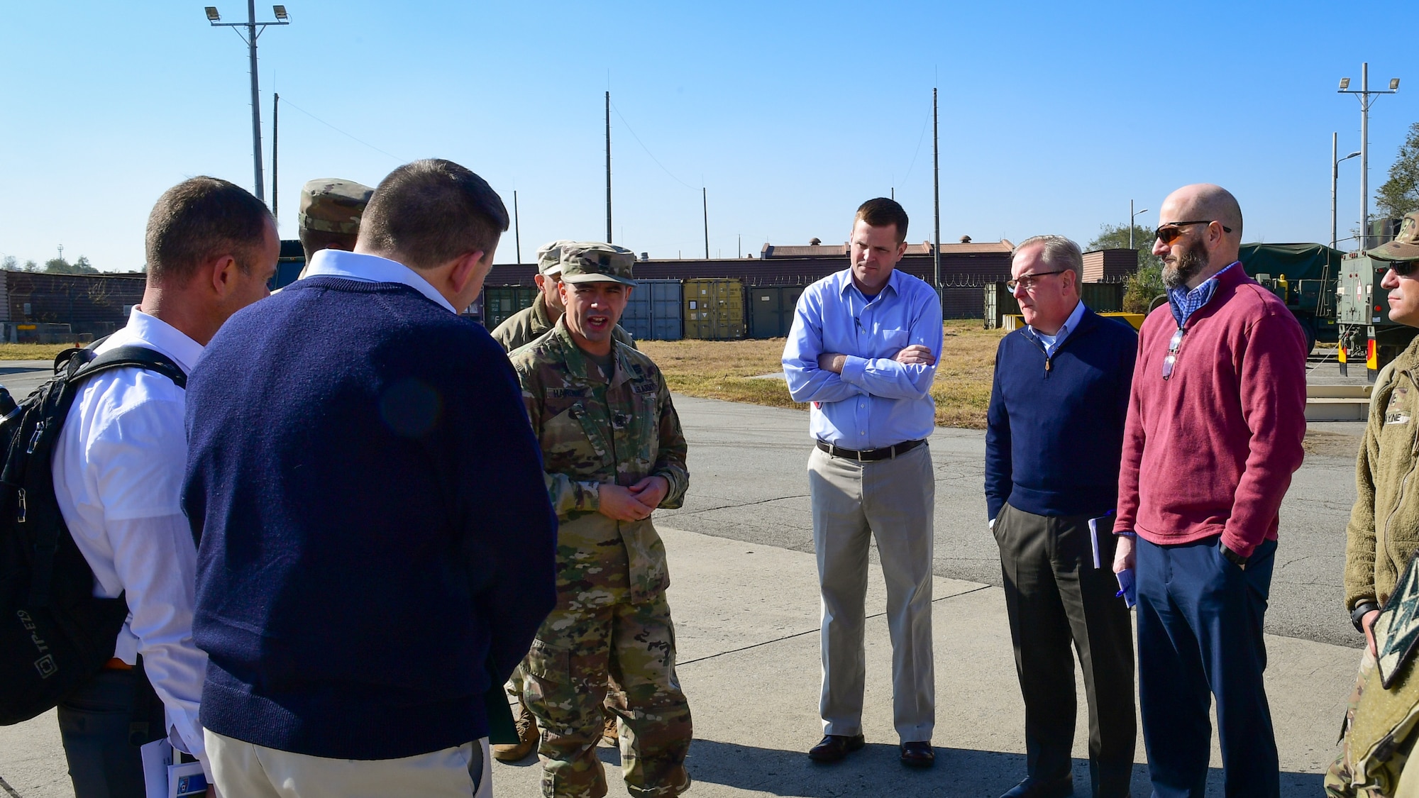 Members of the U.S. Army 35th Brigade Delta 6-52 Air Defense Artillery, speak with members of the House Armed Services Committee during a tour of Osan Air Base, Republic of Korea, Oct. 31, 2018.
