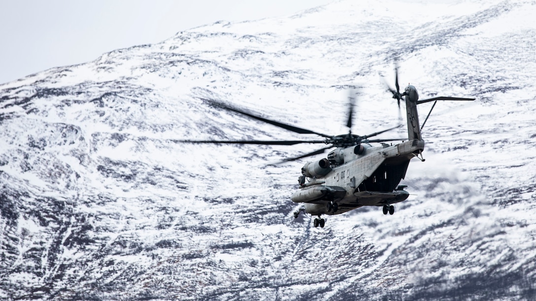 A U.S. Marine Corps CH-53E Super Stallion with Marine Heavy Helicopter Squadron 366 conducts flight operations during Trident Juncture 18 at Oppdal Air Base, Norway, Nov. 4, 2018. The exercise enhances the U.S. and NATO Allies’ and partners’ abilities to work together collectively to conduct military operations under challenging conditions. HMH-366 is with Marine Aircraft Group 29, 2nd Marine Aircraft Wing.