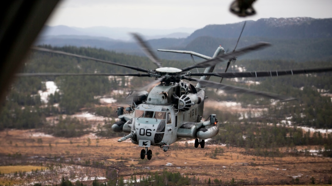 A CH-53E Super Stallion with Marine Heavy Helicopter Squadron 366 conducts flight operations during Trident Juncture 18 at Vaernes Air Base, Norway, Nov. 2, 2018. The exercise enhances the U.S. and NATO Allies’ and partners’ abilities to work together collectively to conduct military operations under challenging conditions. HMH-366 is with Marine Aircraft Group 29, 2nd Marine Aircraft Wing.