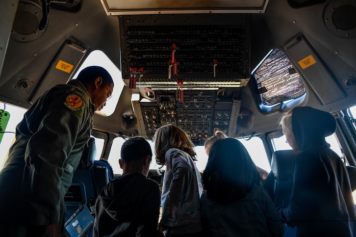 1st Lt. Akil Romany, 16th Airlift Squadron pilot, gives a tour of a cockpit of a C-17 Globemaster III, Nov. 3, 2018, at Joint Base Charleston, S.C.
