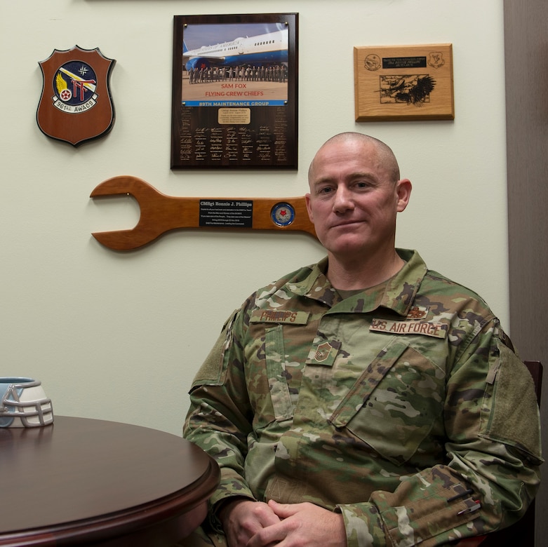 Chief Master Sergeant Ronnie Phillips, 437th Airlift Wing command chief, in his Wing Headquarters office at Joint Base Charleston, S.C. Phillips advises the wing commander, two groups, and seven squadron commanders on the utilization of over 1,600 enlisted members to ensure the wing's combat readiness.