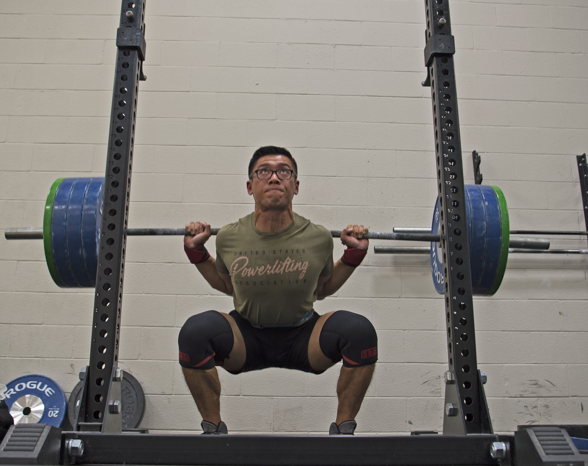 U.S. Air Force Staff Sgt. Allen Plata, 20th Equipment Maintenance Squadron stockpile management crew chief, squats to continue to keep proper form during off-season at Shaw Air Force Base, S.C., Nov. 1, 2018.