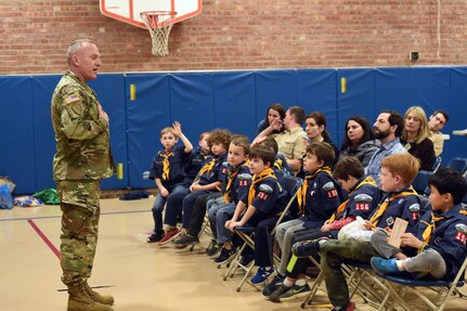 Sgt. David Lietz, public affairs sergeant with the 85th Support Command, speaks with students about his service during the Lyon Elementary School Veteran’s Day observance in Glenview, Illinois, November 5, 2018.