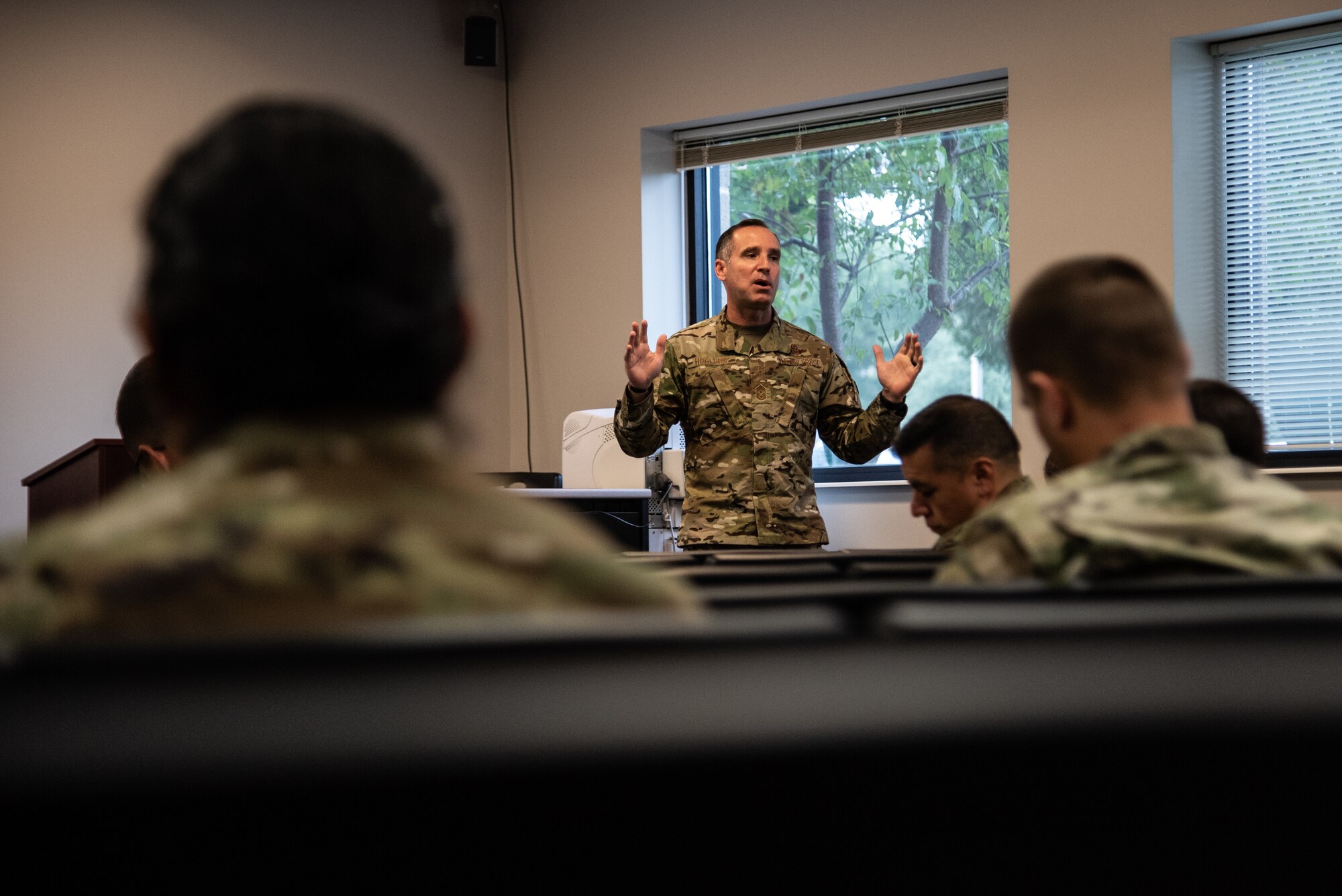 U.S. Air Force Chief Master Sgt. Daniel Hoglund, 20th Fighter Wing command chief, speaks to Airmen attending a superintendent course at Shaw Air Force Base, S.C., Nov. 1, 2018.