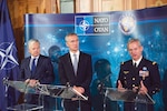 Former Supreme Allied Commander Transformation General Denis Mercier (right) speaks at a NATO-Industry Forum in 2016.