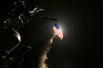 The guided-missile destroyer USS Porter conducts strike operations against a target in 2017. (U.S. Navy/Ford Williams)