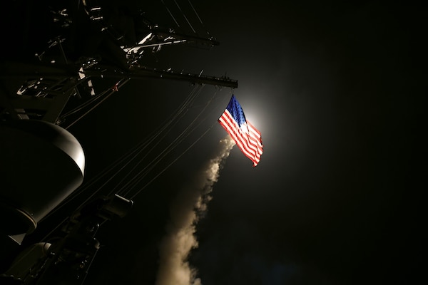 The guided-missile destroyer USS Porter conducts strike operations against a target in 2017. (U.S. Navy/Ford Williams)