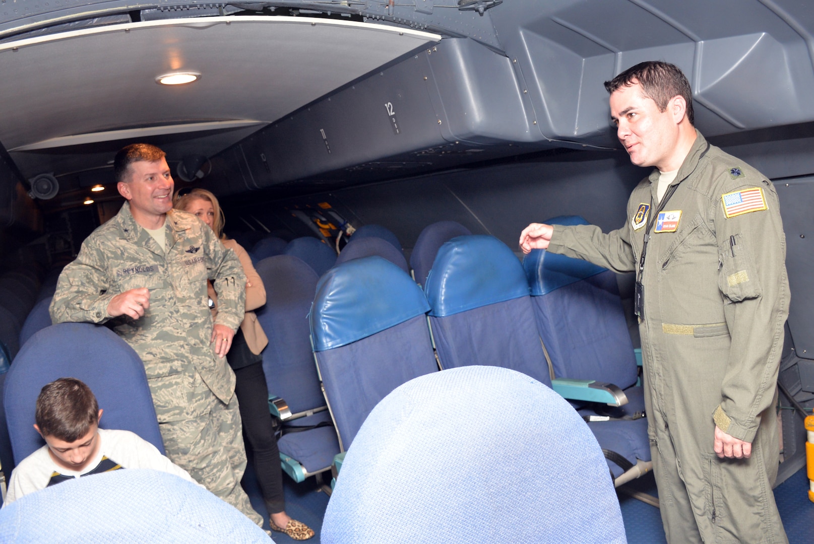 Lt. Col. Ryan A. Clark, 356th Airlift Squadron flight instructor, describes troop compartment features and capabilities to Brig. Gen. George M. Reynolds, 25th Air Force vice commander, at Joint Base San Antonio-Lackland, Texas Nov. 2, 2018.