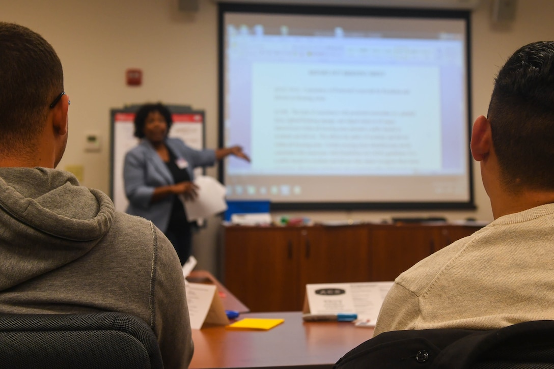 Two delegates participate in the Army Family Action Plan discussions at Joint Base Langley-Eustis, Virginia, Oct. 31, 2018. The AFAP provides community members, including service members, spouses, retirees and civilian employees, the opportunity to discuss issues affecting the installation and present them to the commander. (U.S. Air Force photo by Senior Airman Derek Seifert)