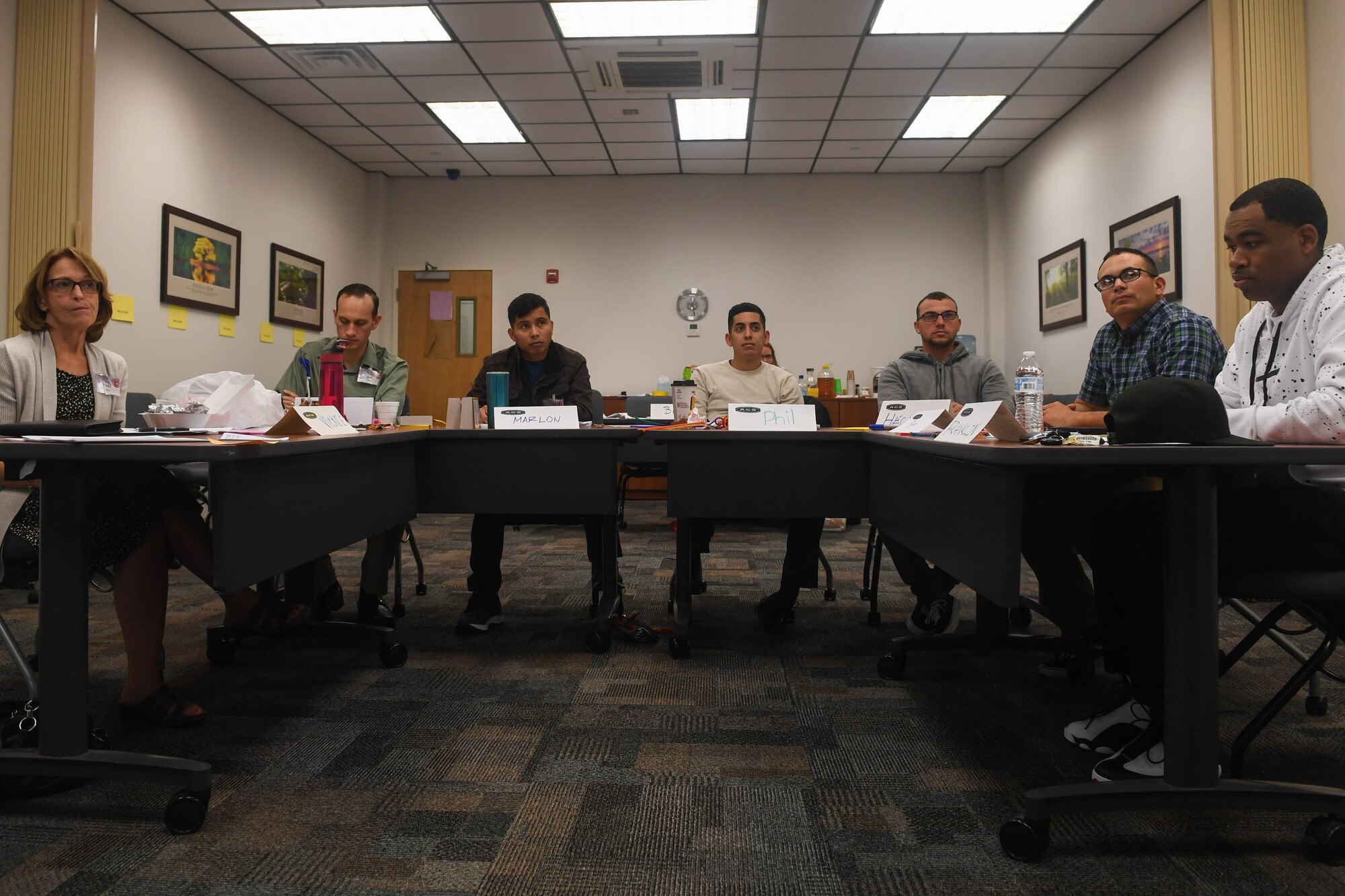 Delegates of the Army Family Action Plan discuss issues relevant to the Fort Eustis community during the AFAP conference at Joint Base Langley-Eustis, Virginia, Oct. 31, 2018. The AFAP is a U.S. Army program that addresses concerns of the community that can affect not only the Army but the other services as well, such as identification card system issues and paternal leave for new fathers. (U.S. Air Force photo by Senior Airman Derek Seifert)