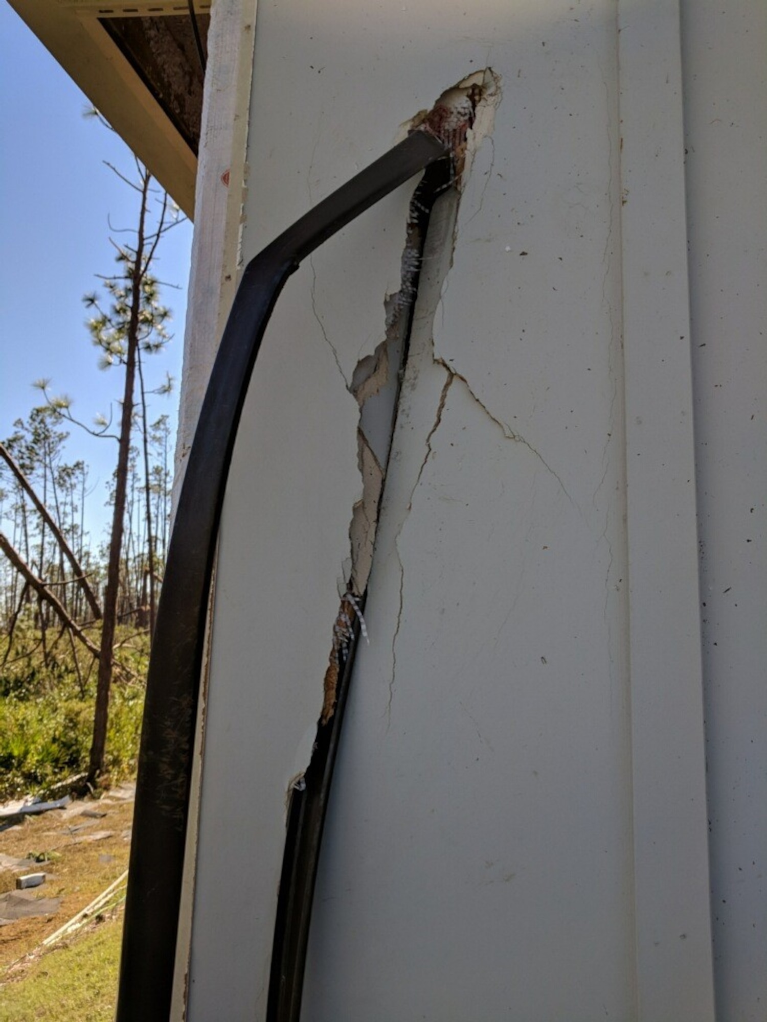 The strong winds from Hurricane Michael tossed a patio table into the side of Linda LeBarron-Block's home.