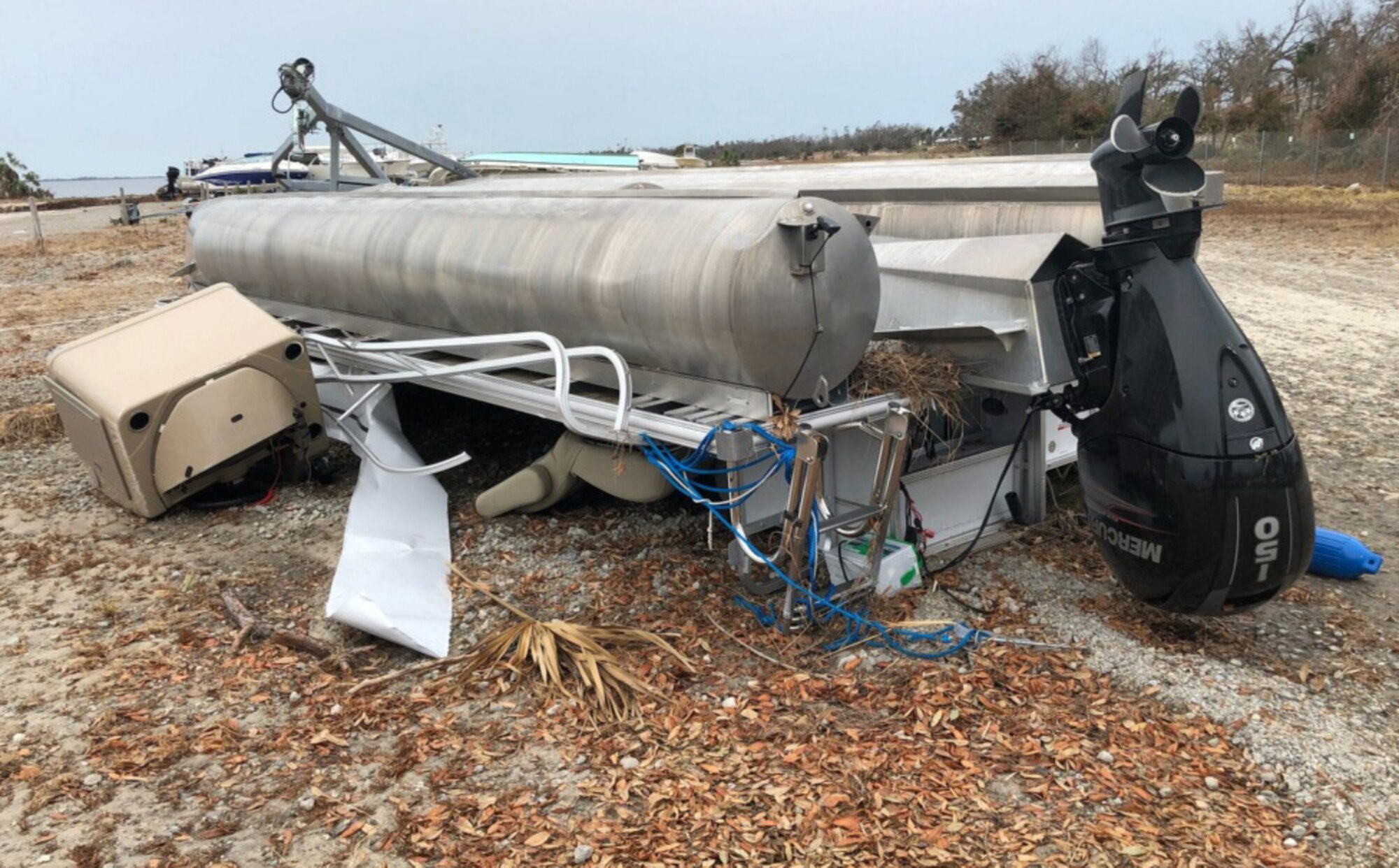 Hurricane Michael overturned boats at the Tyndall AFB, Florida, marina, including one that belongs to Linda Le-Barron-Block, who is part of the AFIMSC Resources Directorate team at Tyndall.