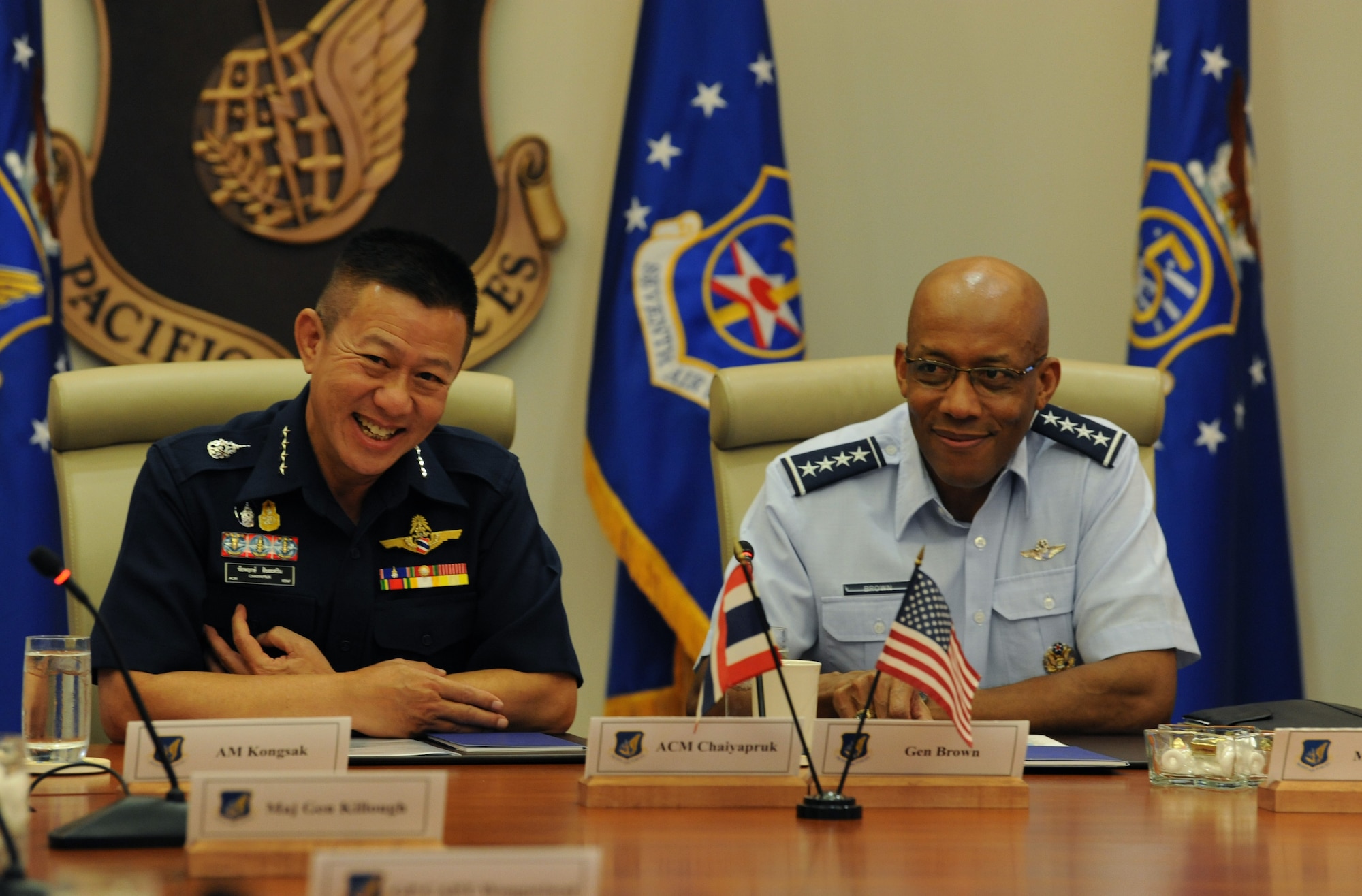 Commander-in-Chief of the Royal Thai air force (RTAF) Chief Air Marshal Chaiyapruk Didyasarin, and U.S. Air Force Commander of Pacific Air Forces (PACAF), Gen. CQ Brown, Jr., listen as USAF and RTAF members introduce themselves before a briefing at Headquarters PACAF, Joint Base Pearl Harbor-Hickam, Hawaii, Oct. 29, 2018.