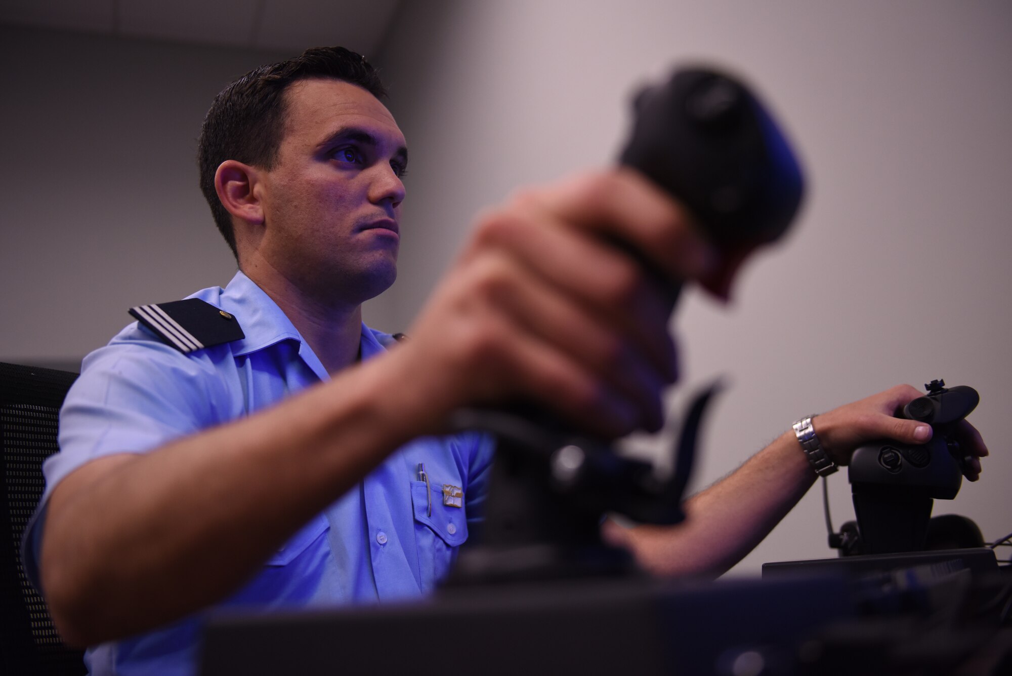 A cadet from a Latin American service academy flies an F-35A Lightning II simulator in the F-35 Academic Training Center Oct. 31, 2018, at Luke Air Force Base, Ariz. Cadets visiting Luke as a part of the Department of Defense Latin American Cadet Initiative program had the opportunity to fly simulators, walk the flightline, and speak to U.S. Air Force officers about their experiences. (U.S. Air Force photo by Senior Airman Ridge Shan)