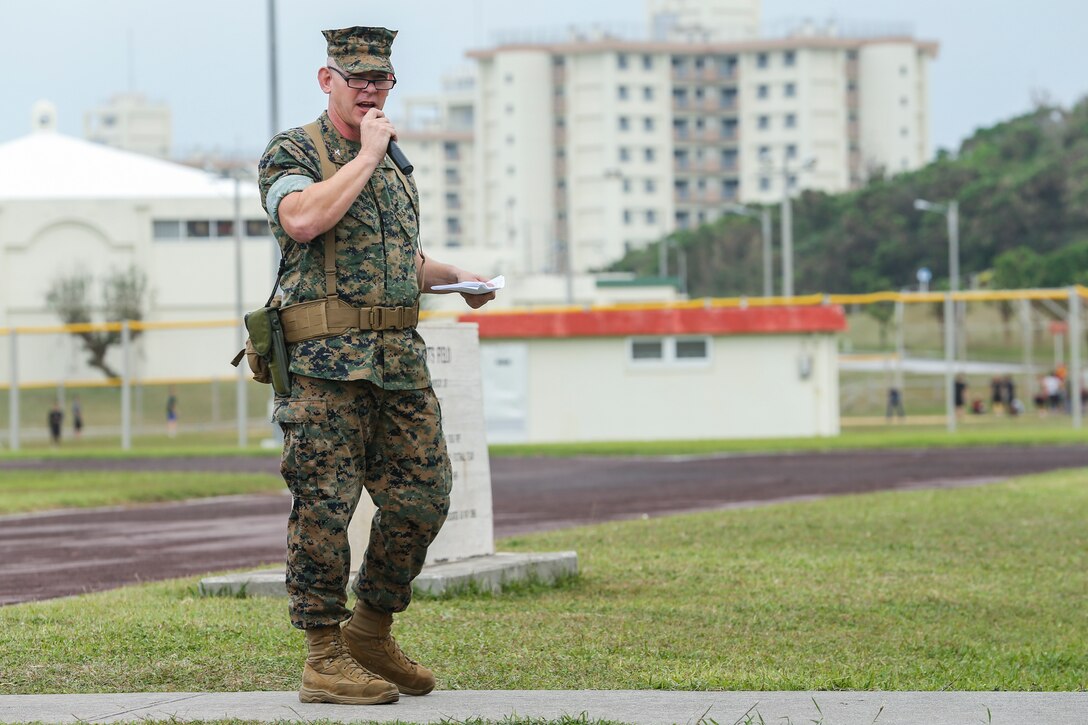 Col. Scott R. Johnson addresses Marines with Combat Logistics Regiment 37 and their families during a redesignation ceremony at Camp Kinser, Japan Nov. 2, 2018. Although Headquarters Regiment was renamed CLR-37, the function of CLR-37 will continue to service 3rd MLG to provide logistic combat elements for III Marine Expeditionary Force. Johnson, a native of Kansas City, Missouri, is the commanding officer of CLR-37. (U.S. Marine Corps photo by Lance Cpl. Armando Elizalde)