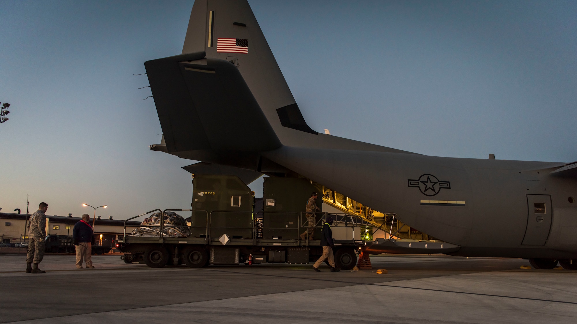 Loading cargo into the belly of a Herc