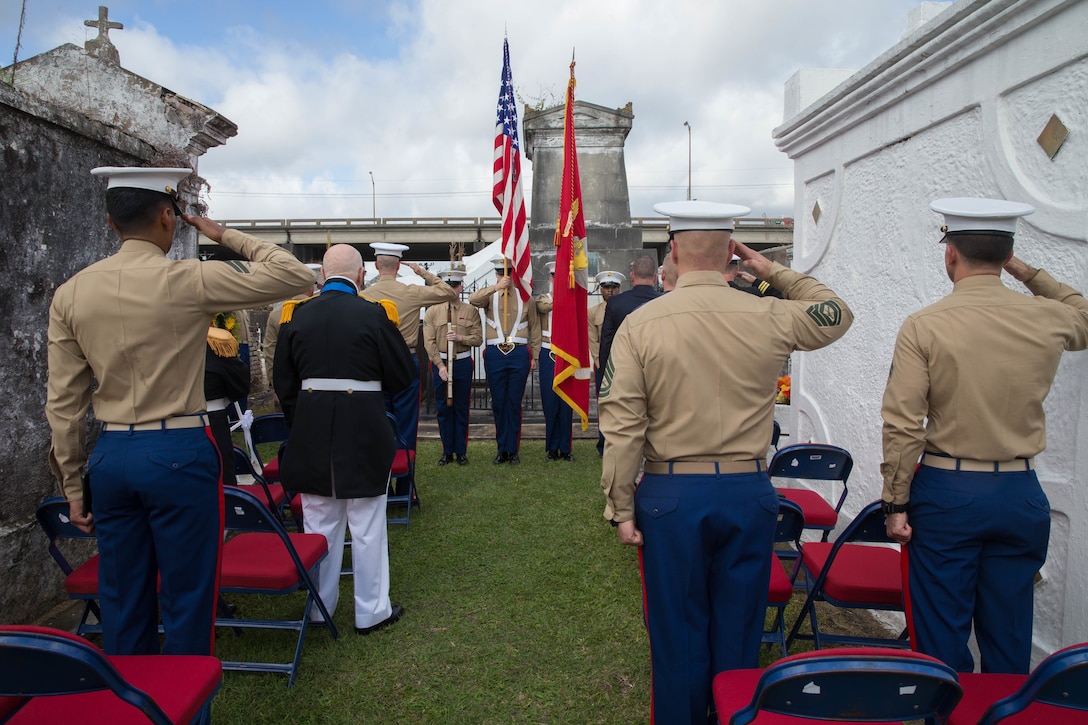Marines, with Marine Forces Reserve, salute the gravesite of Marine Corps Maj. Daniel Carmick during the playing of the national anthem at St. Louis Cemetery No. 2 in New Orleans, Nov. 6, 2018. This ceremony is held annually to celebrate and honor the legacy and actions of Maj. Carmick during the Battle of New Orleans during the War of 1812. Maj. Carmick’s leadership on the battlefield was an essential contribution that resulted in the defeat of British troops and prevented the seizure and conquest of the Louisiana territory. (U.S. Marine Corps photo by Lance Cpl. Samantha Schwoch/released)