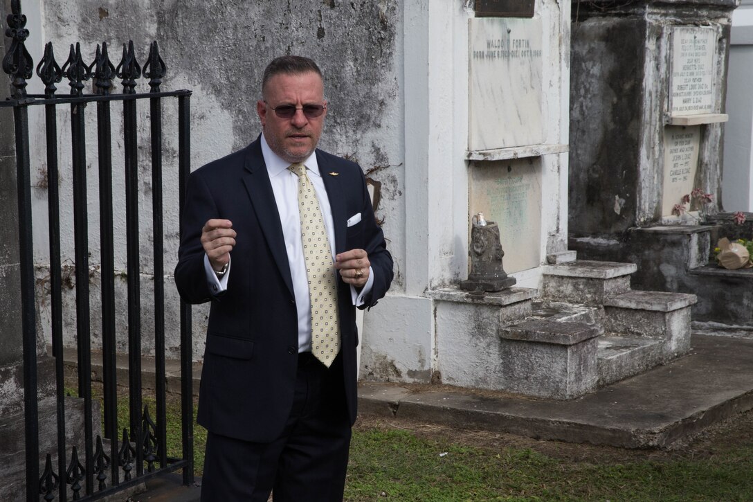 Retired Marine Corps Col. Paul B. Deckert speaks about the legacy of Marine Corps Maj. Daniel Carmick during a wreath laying ceremony at St. Louis Cemetery No. 2 in New Orleans, Nov. 6, 2018. This ceremony is held annually to celebrate and honor the legacy and actions of Maj. Carmick during the Battle of New Orleans during the War of 1812. Maj. Carmick’s leadership on the battlefield was an essential contribution that resulted in the defeat of British troops and prevented the seizure and conquest of the Louisiana territory. (U.S. Marine Corps photo by Lance CPl. Samantha Schwoch/released)