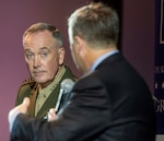 Marine Corps Gen. Joe Dunford (left), chairman of the Joint Chiefs of Staff, speaks with Peter Feaver, a professor of political science and public policy at Duke University, during a discussion with students in Duke’s Program in American Grand Strategy in Durham, N.C., Nov. 5.