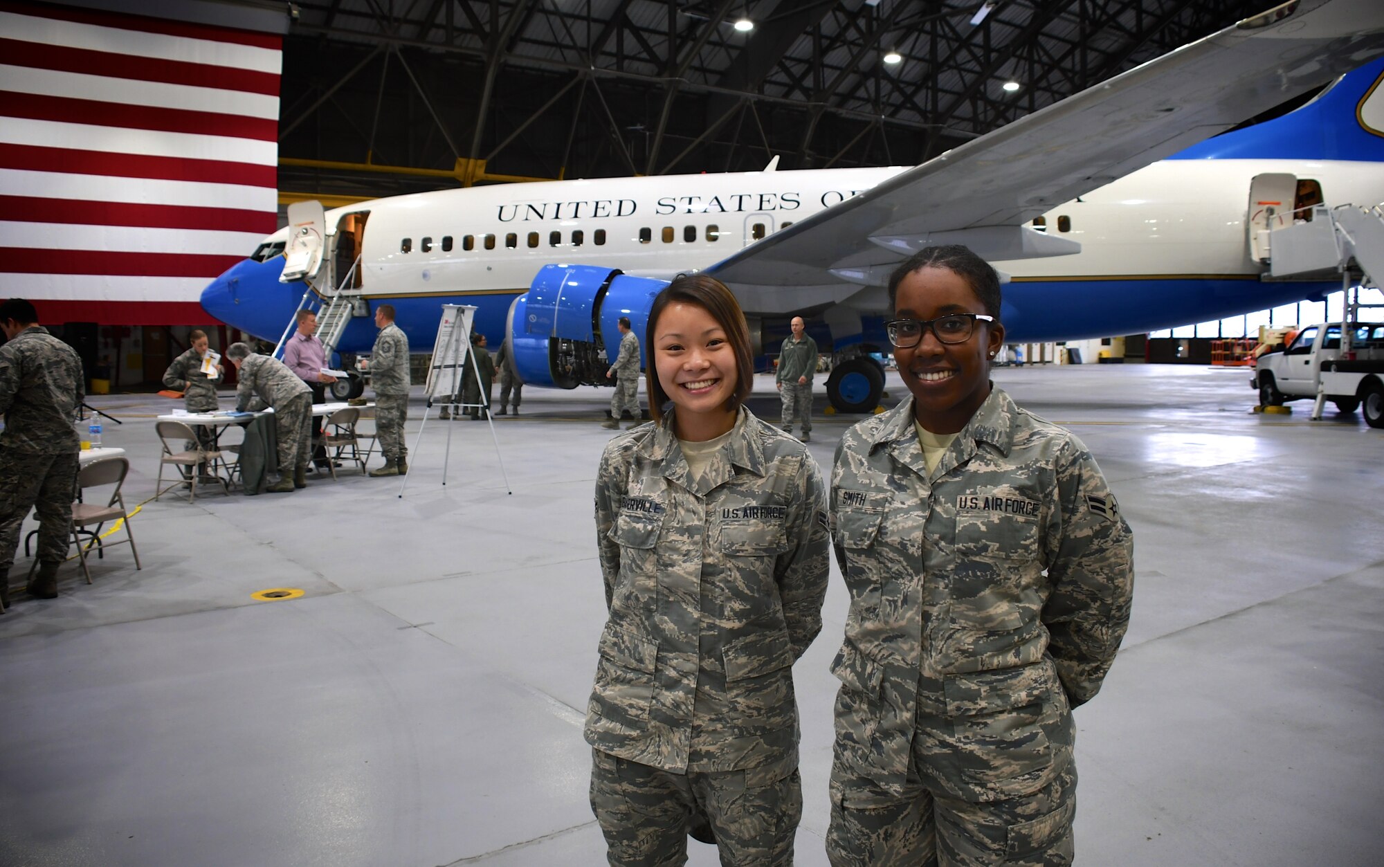 The 932nd Airlift Wing educated Airmen about various careers available within the Illinois unit, and cultures in the background of various members, as they honored their contributions during a Career and Diversity Day.  Here, Airman 1st Class Kathryn Baskerville and Airman 1st Class Kaida Smith, both from 932nd Force Support Squadron, pause in front of the 932nd AW's C-40 plane.  Booths from various career fields showed off job openings and training needed to accomplish those missions like security forces and aircraft operations.  A process booth took suggestions from members on how to improve the unit as well.  The event honored cultural diversity, and exposed 932nd AW Airmen to the qualities that make various cultures unique; it took place November 4, 2018, at Scott Air Force Base, Illinois.  (U.S. Air Force photo by Lt. Col. Stan Paregien)