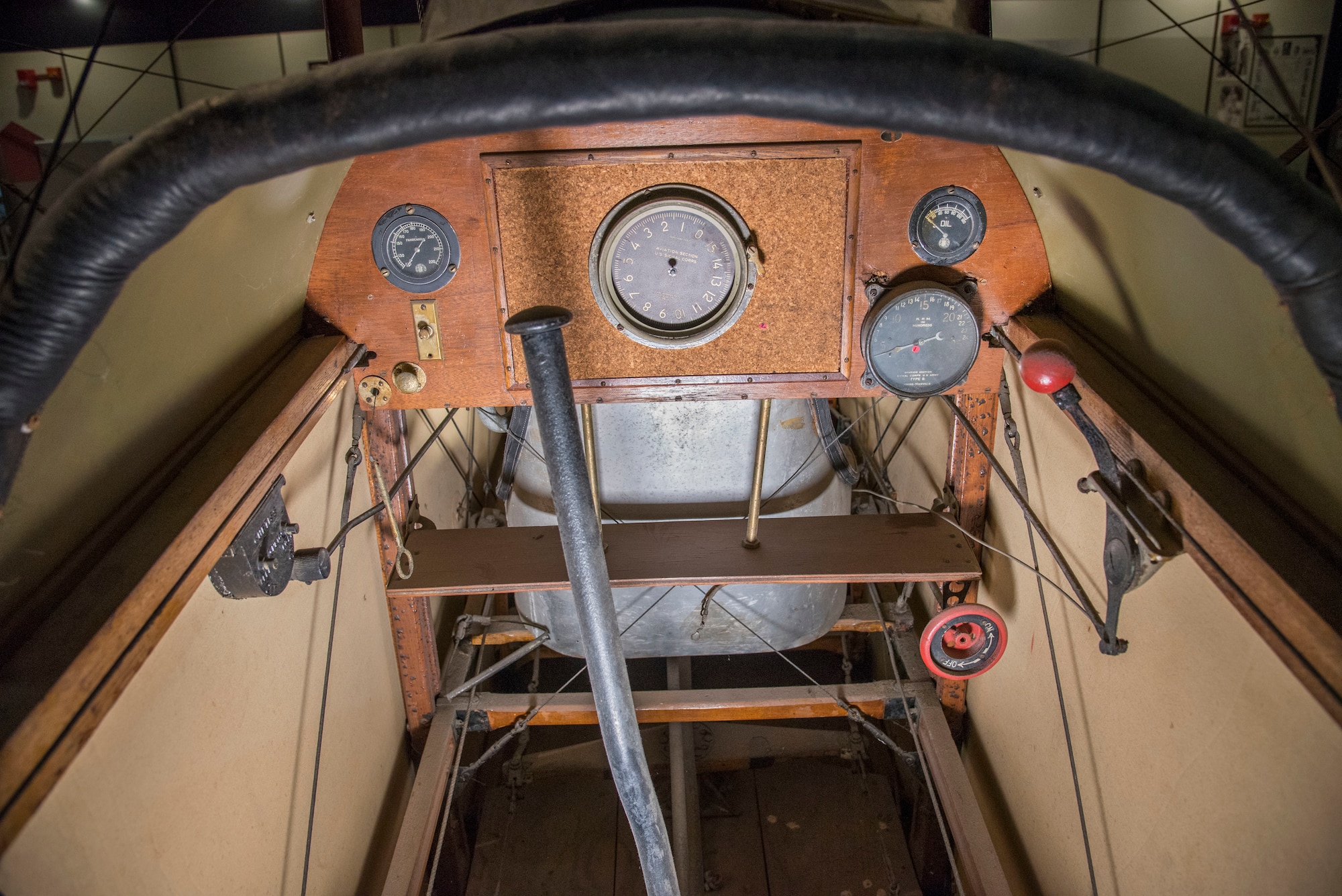 DAYTON, Ohio -- National Museum of the U.S. Air Force restoration crews lowered the Curtiss JN-4D Jenny from its hanging position on Nov. 7 2018 in the Early Years Gallery. Plans call for the Avro 504K to hang above the JN-4D after the restoration process is completed. (U.S. Air Force photo by Ken LaRock)