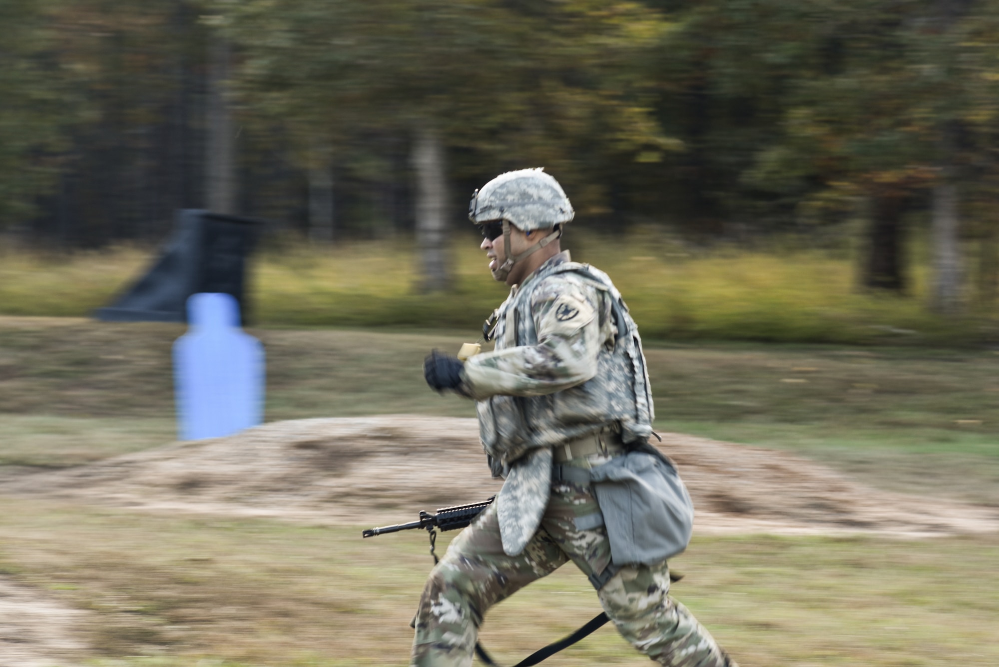 U.S. Army Sgt. Erick Ramos, 7th Transportation Brigade (Expeditionary) Headquarters and Headquarters Command driver, competes in a timed Combat Readiness Drill at Fort Pickett, Virginia, Oct. 29, 2018.