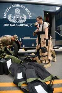 1st Lt. Paul Underwood, 628th Explosive Ordinance Disposal flight chief, dons a bomb suit before the start of the 2018 Charleston Veterans Day Parade Nov. 4, 2018, in Charleston, S.C. This year’s Veterans Day, officially recognized Nov. 11, 2018, will mark the 100th anniversary of the end of the First World War.