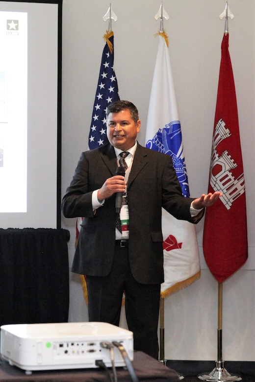 John Moreno, director of Regional Business for the South Pacific Division, talks to college students and recent graduates attending the USACE seminar at the Hispanic Engineer Achievement Awards Corporation conference Oct. 19 in Pasadena, California. With the theme, "Travel the world ... make an impact ... build big things," panel members presented information on the Corps, its missions and the opportunities a Corps career provides employees.