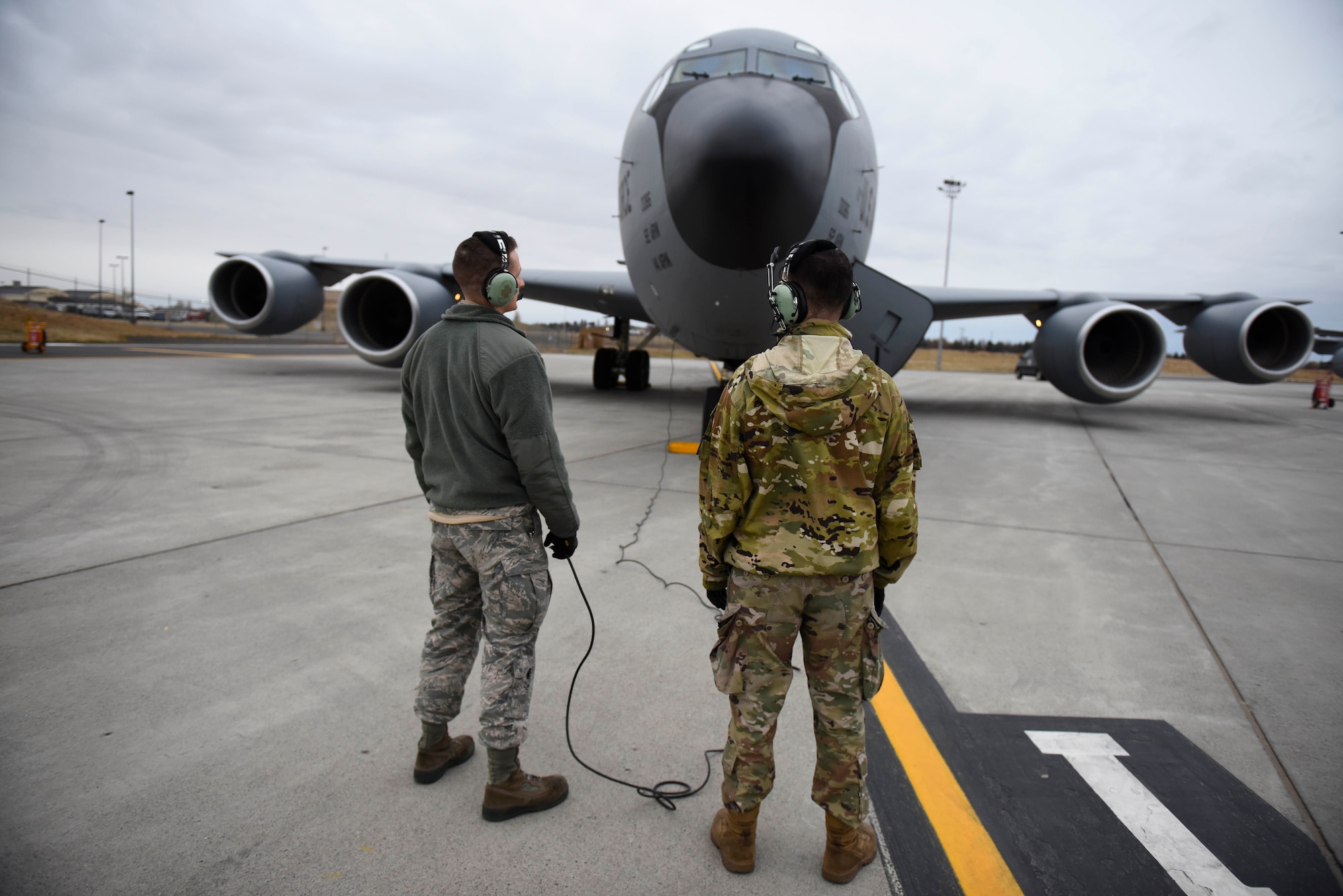 Staff Sgt. Austin Garcia and Senior Airman Dan O'Connor, 92nd Aircraft Maintenance Squadron crew chiefs supervise pre-flight checks during Exercise Global Thunder 2019 at Fairchild Air Force Base, Washington, November 2018. Global Thunder is a U.S. Strategic Command exercise designed to ensure an efficient mission response by testing Airmen's ability to execute command, control and operational procedures during simulated combat scenarios. (U.S. Air Force photo/Airman 1st Class Lawrence Sena)