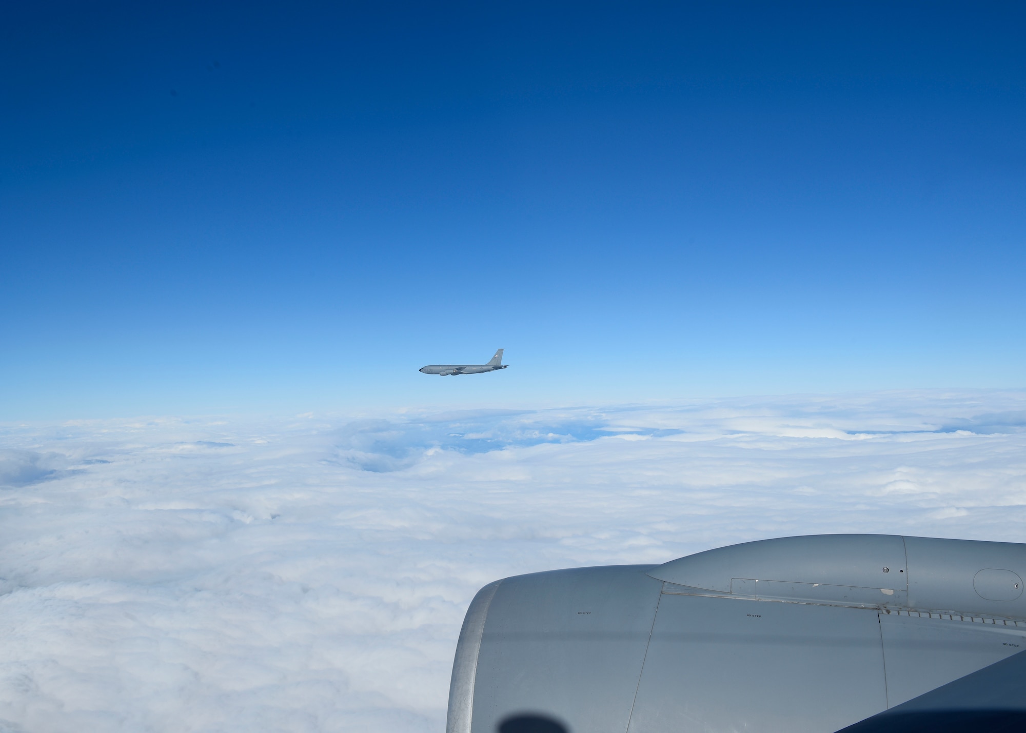 A KC-135 Statotanker flies to perform refueling connections with a B-52 Stratofortress during Exercise Global Thunder 2019 over the U.S. Northwestern Region, November 2018. Global Thunder is a U.S. Strategic Command exercise designed to ensure an efficient mission response by testing Airmen's ability to execute command, control and operational procedures during simulated combat scenarios. (U.S. Air Force photo/Airman 1st Class Lawrence Sena)