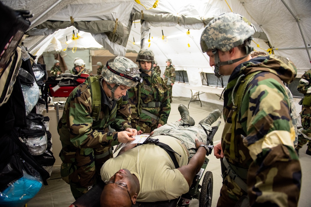 Airmen with the 182nd Airlift Wing, Illinois National Guard, practice medical triage environment skills during a full-spectrum readiness exercise at the 182nd Airlift Wing in Peoria, Ill., Nov. 3, 2018.