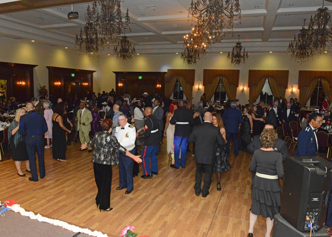 Veterans and guests of all ages danced at the end of the Coffee4Vets Veterans Military Ball at the John P. Eliopulos Hellenic Center in Lancaster, California, Nov. 3. (U.S. Air Force photo by Kenji Thuloweit)