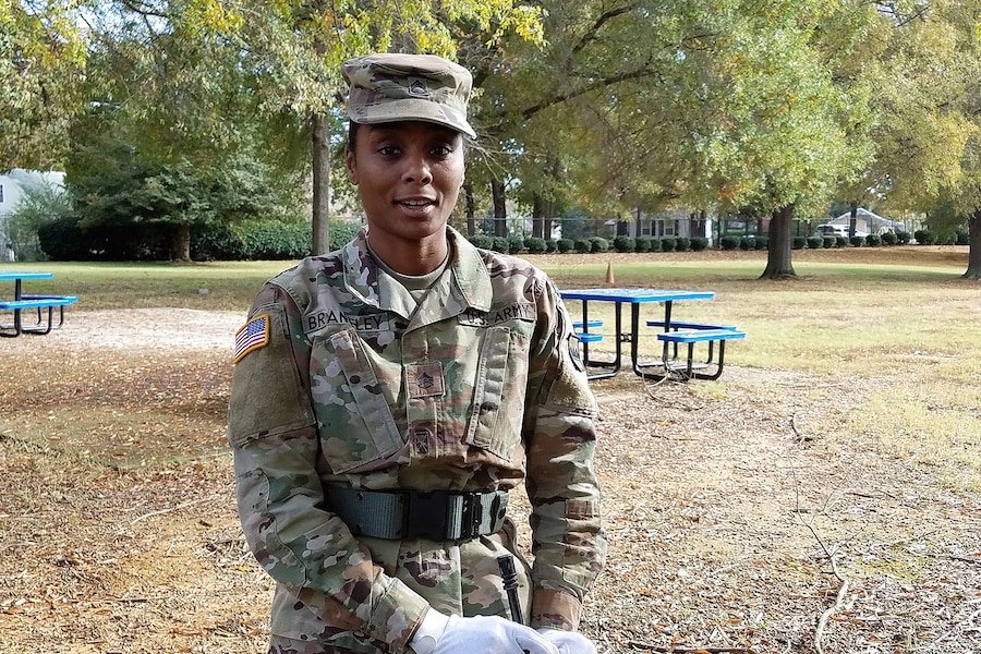 A sergeant standing in a park