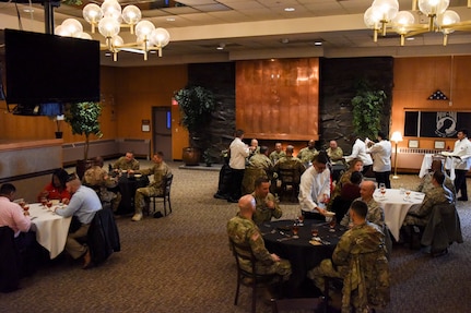 A group of Airmen with the 673d Force Support Squadron and food-service Soldiers from Joint Base Elmendorf-Richardson, Alaska, host a grand opening lunch for the Joint Culinary Institute operated at the Gold Rush Inn. JCI is a new bi-monthly, two-week course, providing 10 food-service members from any military branch an opportunity to experience in-depth courses relating to the profession.