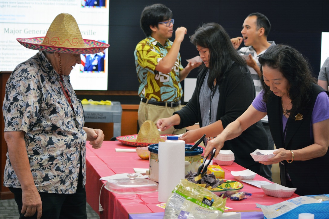 Chief of Safety and Occupational Health at Honolulu District USACE, Jeff Cochran serves fellow teammates chips and salsa as the District concluded National Hispanic Heritage Month by having a Salsa Cook Off. Hispanic Heritage Month is observed from Sept. 15 to Oct. 15, each year. The observance is celebrated during this timeframe due to many significant events for various Hispanic communities which fall within the observance period.  Hispanics have had a profound and positive influence on our country through their strong commitment to family, faith, hard work, and service. They have enhanced and shaped our national character with centuries-old traditions that reflect the multiethnic and multicultural customs of their community.