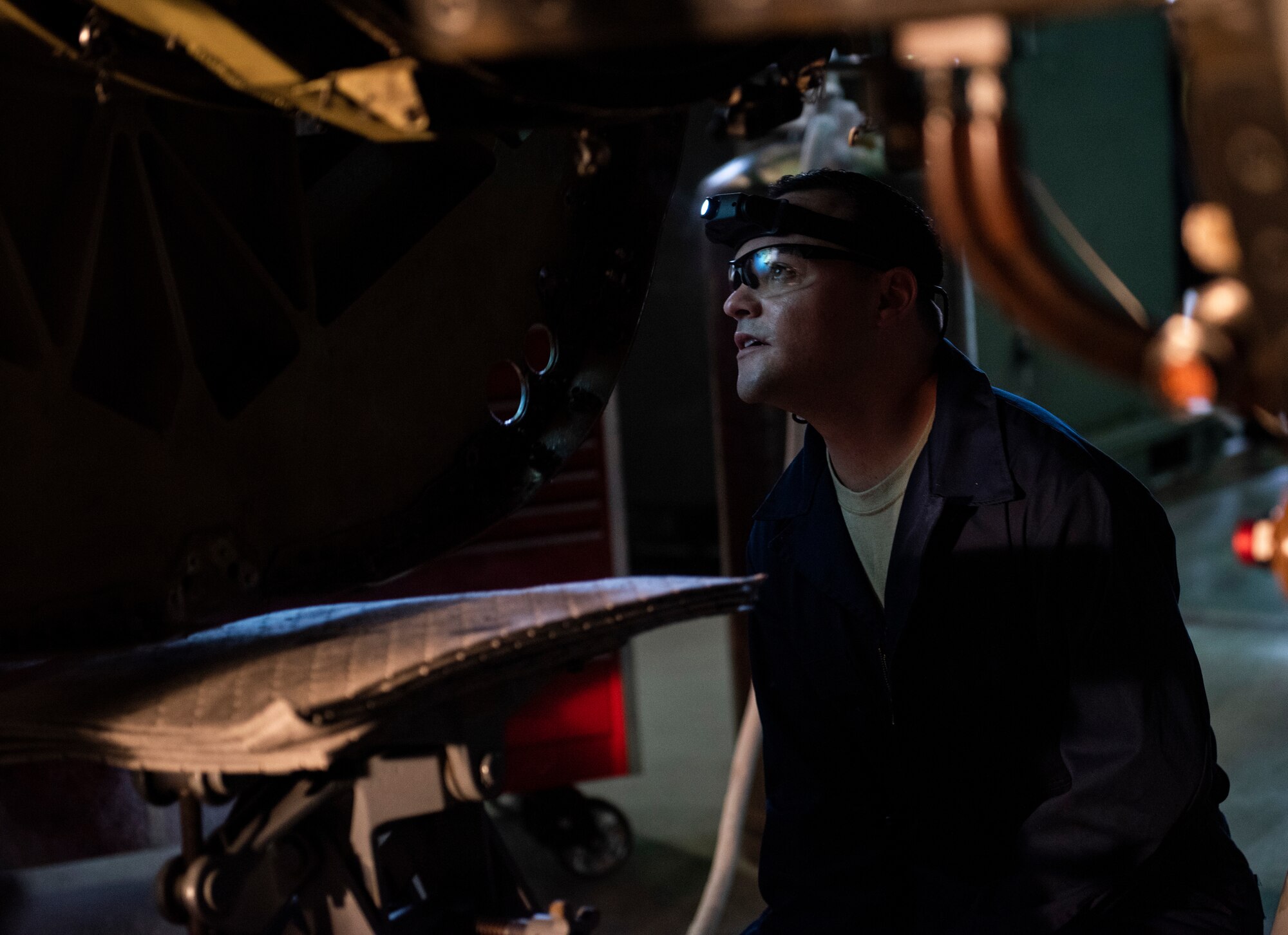 U.S. Air Force Staff Sgt. Joseph Gallegos, 309th Aircraft Maintenance Group depot structural maintenance specialist from Hill Air Force Base, Utah, inspects the bulkhead of an F-16 Fighting Falcon with liquid nitrogen at Kunsan Air Base, Republic of Korea, Nov. 8, 2018. Due to normal wear and tear after years of flying and performing combat and training operations, the bulkhead had to be replaced in order to maintain the F-16 Fighting Falcon’s lethality. (U.S. Air Force photo by Senior Airman Stefan Alvarez)