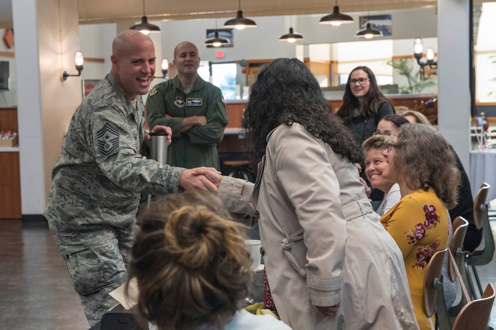 Chief Master Sgt. Randy Kay II, 97th Air Mobility Wing command chief, welcomes new military spouses during the Heartlink Spouse Orientation program.
