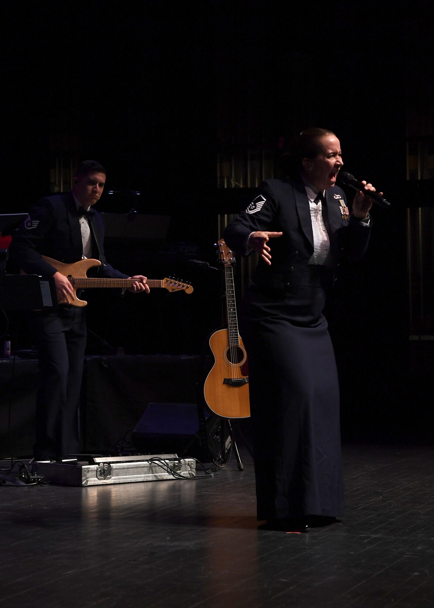 Master Sgt. Rebecca Wischmann, U.S. Air Force Heartland of America Band vocalist, sings for a crowd of military and community members who attended a special Veterans Day concert November 6, 2018, at the Chester Fritz Auditorium in Grand Forks, North Dakota. The Heartland of America Band, which began as the 402nd Army Air Force Band on February 1, 1943 at Ardmore Army Base, Oklahoma, performed a two-hour program to honor all veterans and service members. (U.S. Air Force photo by Airman 1st Class Elora J. Martinez)