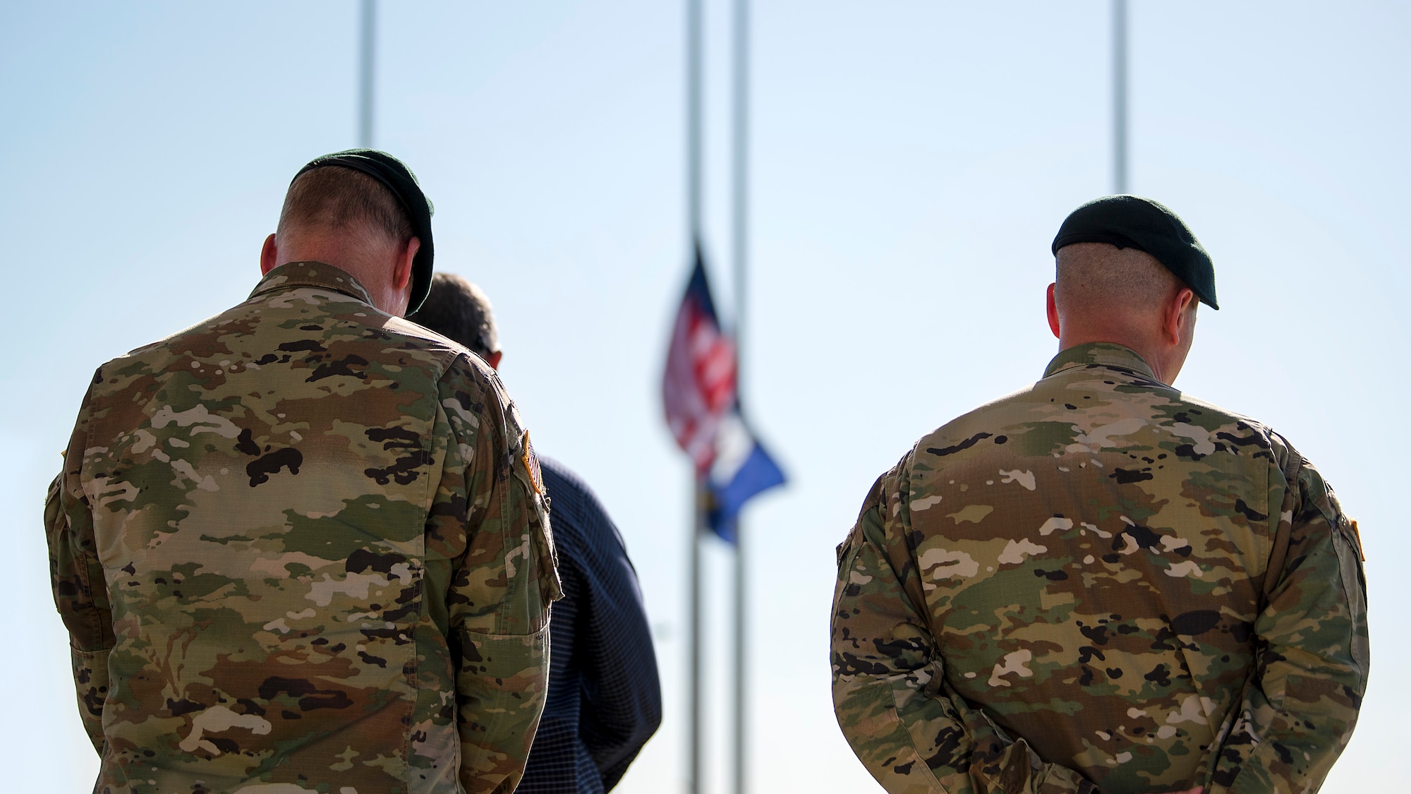 MacDill service members bow their head in remembrance during a Veterans Day event held at MacDill Air Force Base, Fla., Nov. 8, 2018. Veterans Day honors the men and women of the armed forces who have served, past and present.