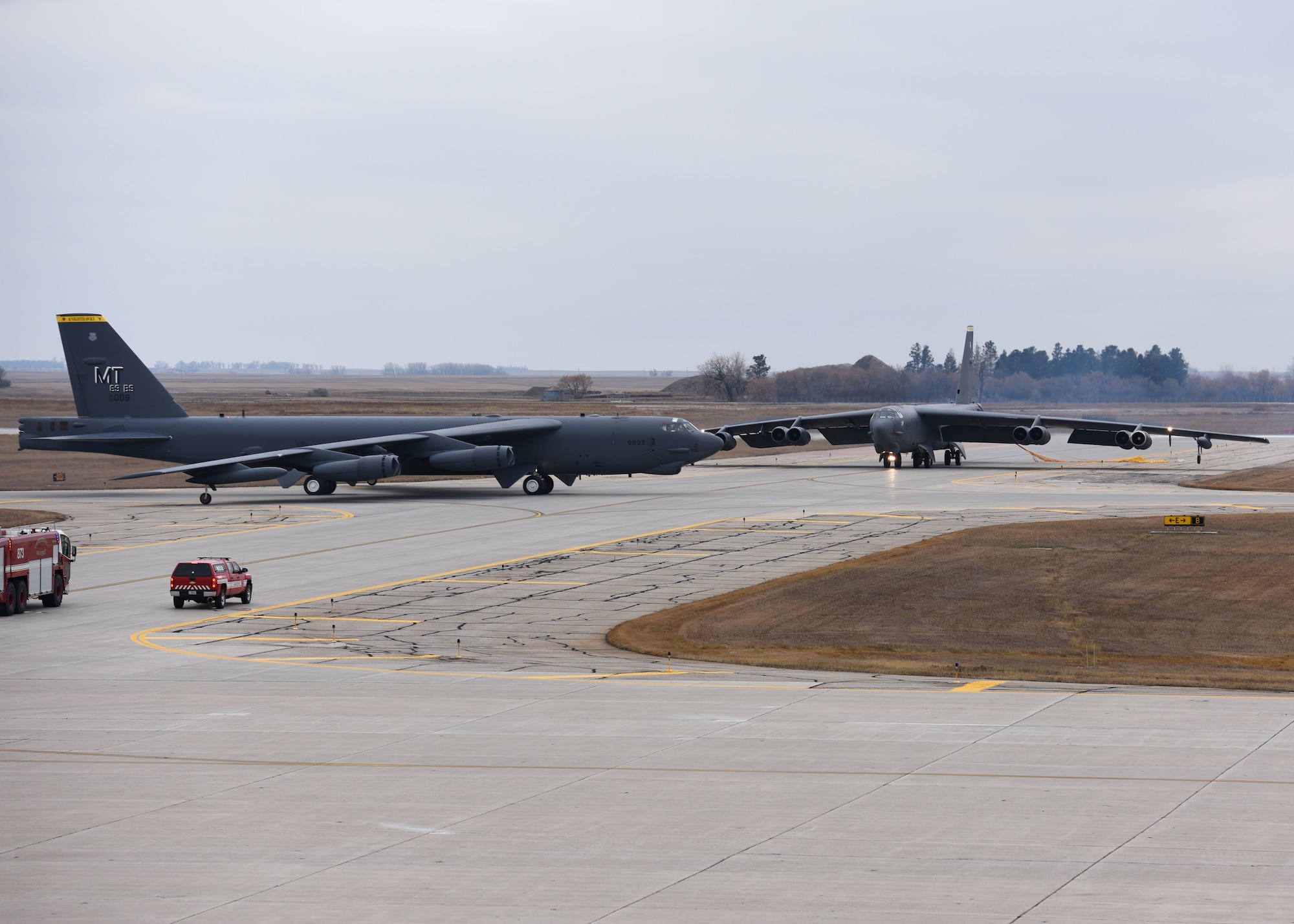 Two B-52H Stratofortresses pass each other on the flightline during Global Thunder 19 at Minot Air Force Base, N.D., Nov. 4, 2018. U.S. Strategic Command headquarters staff, components, and subordinate units participate in Global Thunder to test readiness and ensure a safe, secure, ready and reliable strategic deterrent force. Large-scale exercises of this nature involve extensive planning and coordination and provide unique training for assigned units and allies so they are ready and prepared to execute orders globally wherever and whenever needed. (U.S. Air Force Photo by Airman 1st Class Dillon J. Audit)