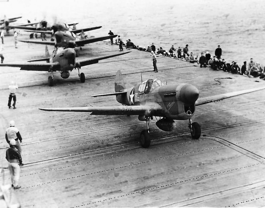 U.S. Army Air Forces P-40F Warhawk fighter aircraft prepare to launch from the deck of the USS Chernago off Morocco in support of Operation Torch, the Allied invasion of North Africa, on Nov. 8, 1942. Flight surgeon Lt. Samuel T. Moore treated Soldiers throughout the North Africa campaign, and kept a diary of his experiences. (Photo courtesy of U.S. Navy)