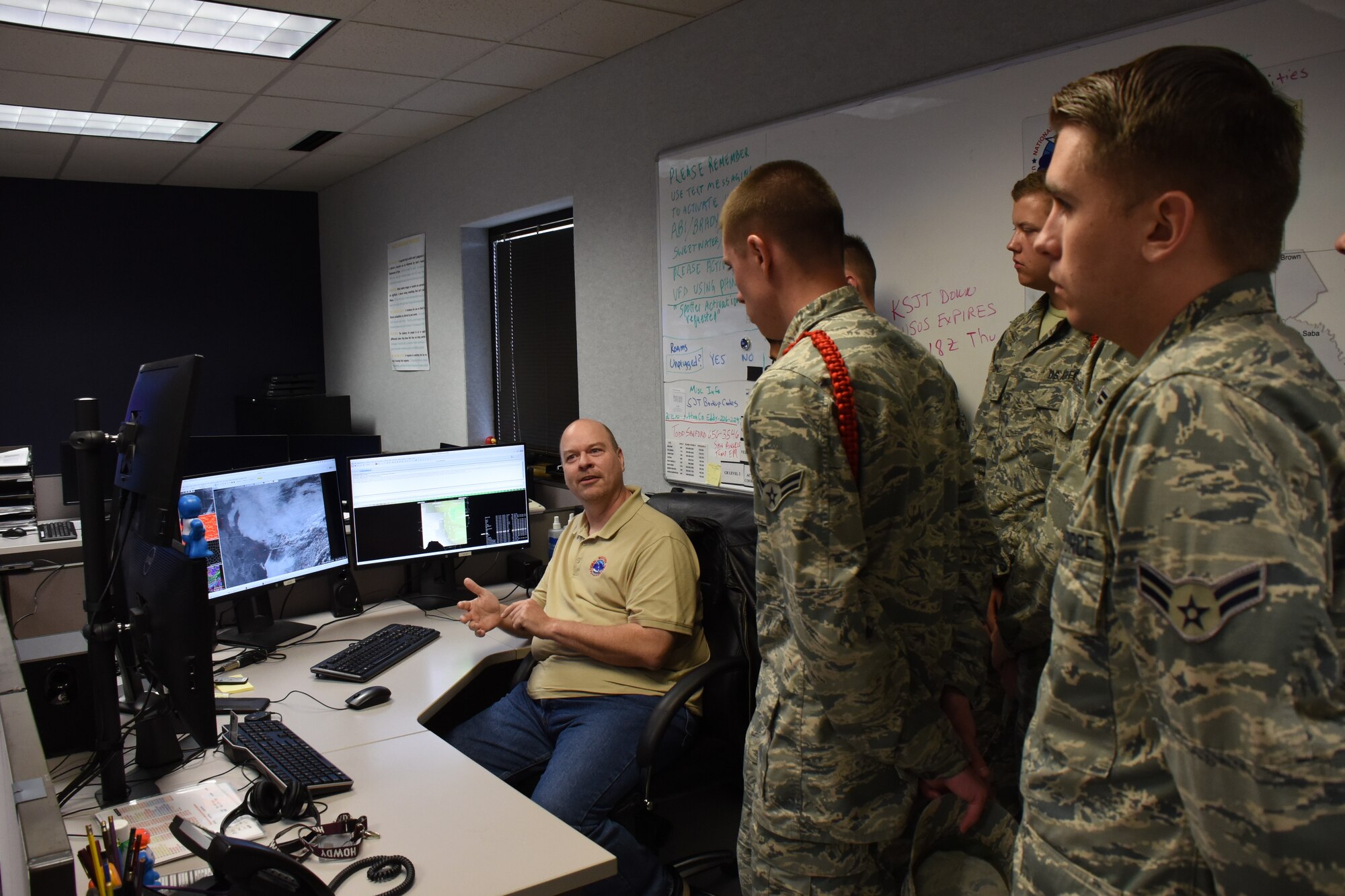 National Weather Service Lead Forecaster, Patrick McCullough speaks about different radar signatures to 312th Training Squadron students at the NWS building in San Angelo, Texas, Nov. 7, 2018. The 312th TRS special instruments training students visited the NWS to receive hands-on training on the Doppler radar operated by NWS. (U.S. Air Force photo by Airman 1st Class Zachary Chapman/Released)