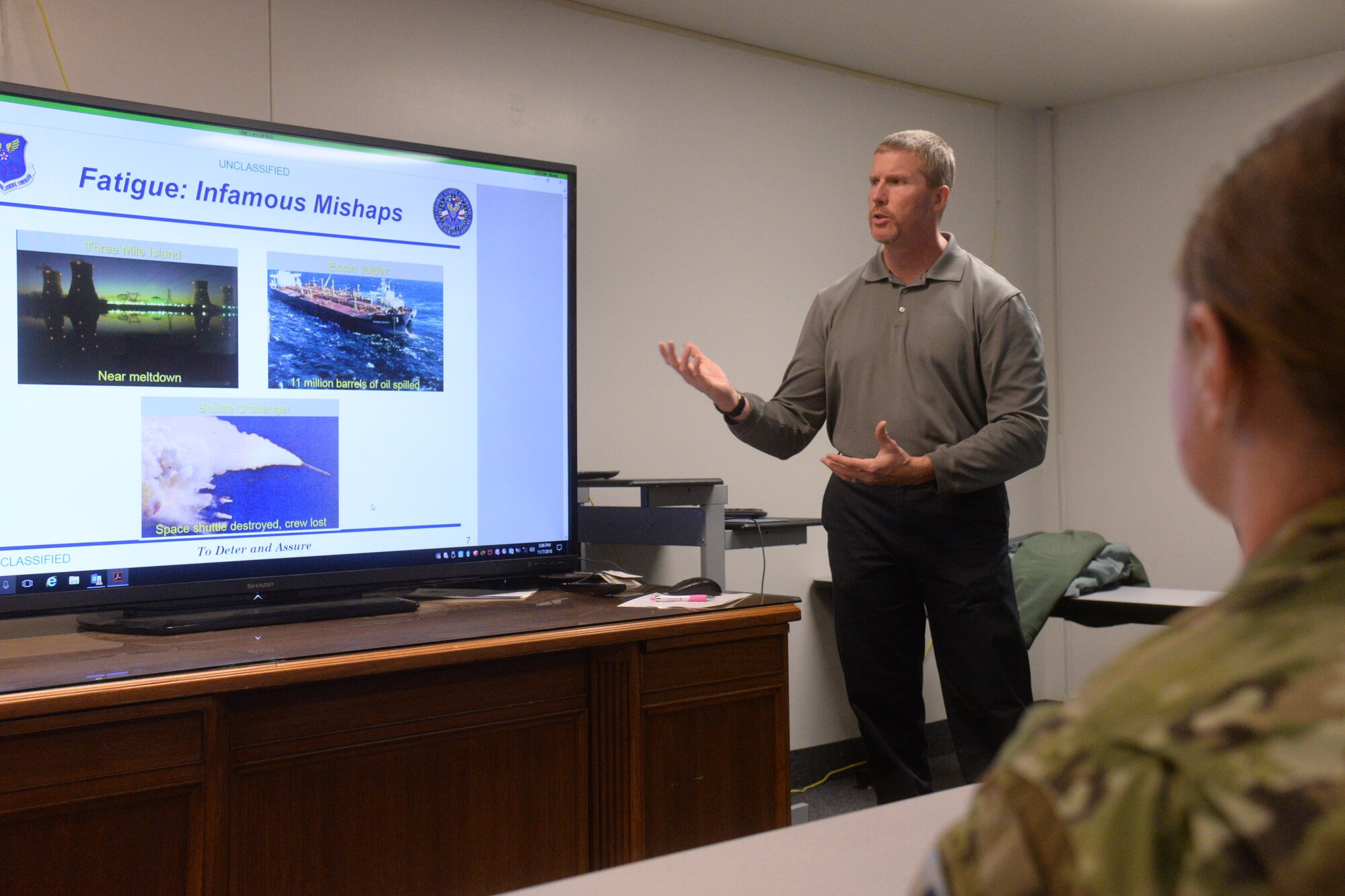 Kirk Clark, 341st Medical Operations Squadron health promotion coordinator, briefs Airmen Nov. 7, 2018, at Malmstrom Air Force Base, Mont.