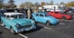 Joint Base McGuire-Dix-Lakehurst community members look at cars displayed during a ceremony marking the reopening of the Auto Hobby Shop on Joint Base MDL, New Jersey, Nov. 7, 2018. Cars were showcased to show the many features the shop has to offer. (U.S. Air Force photo by Airman 1st Class Ariel Owings)