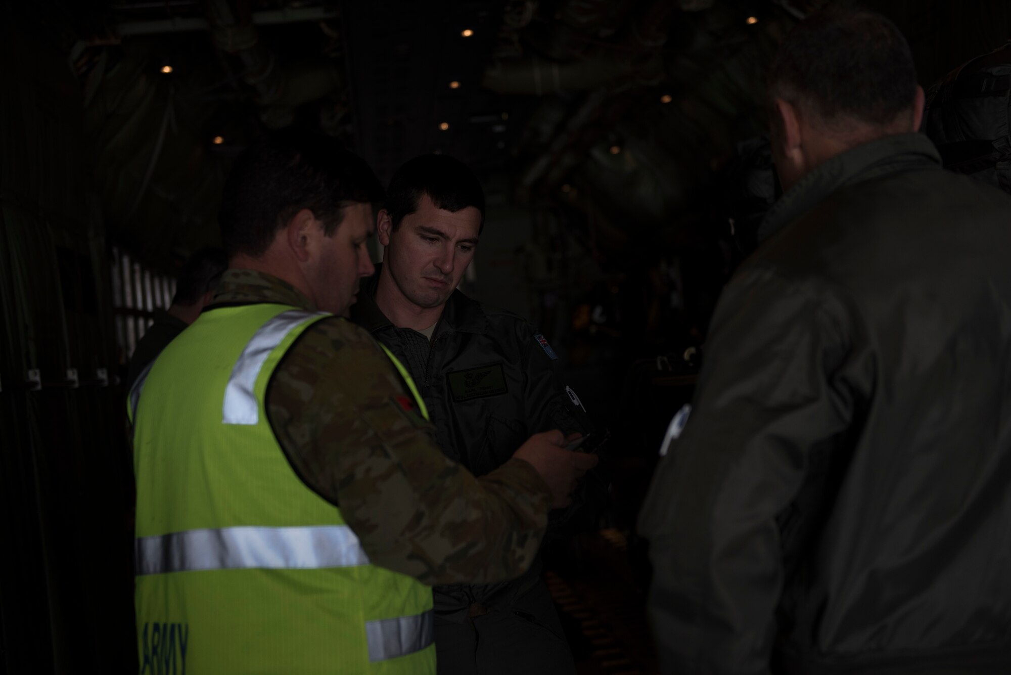 Image of Members of the Australian militiary go through a checklist to ensure they haven’t forgotten anything before a flight at Mountain Home Air Force Base, Idaho, Nov. 1, 2018. They visited Mountain Home to perform training scenarios at Saylor Creek Range. (U.S. Air Force photo by Senior Airman Alaysia Berry)