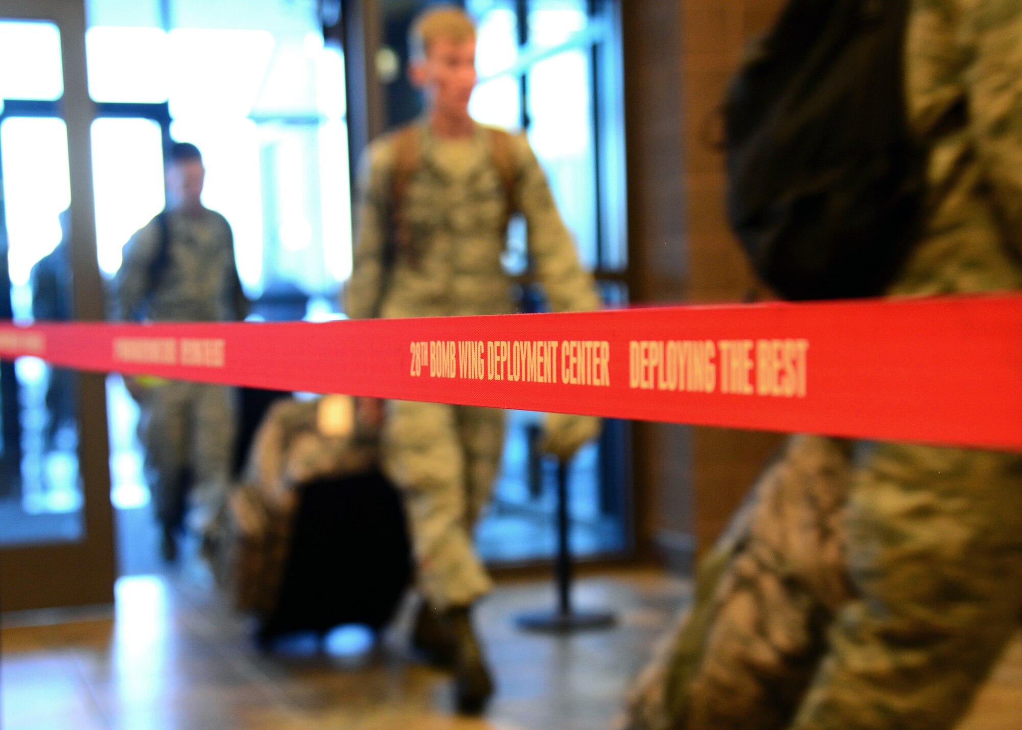 Airmen from the 37th Bomb Squadron and 28th Aircraft Maintenance Squadron go through the deployment processing line at the Deployment Readiness Center at Ellsworth Air Force Base, S.D., Oct. 25, 2018. The Airmen departed for Green Flag, an air-to-surface training exercise in various parts of Nevada and California.