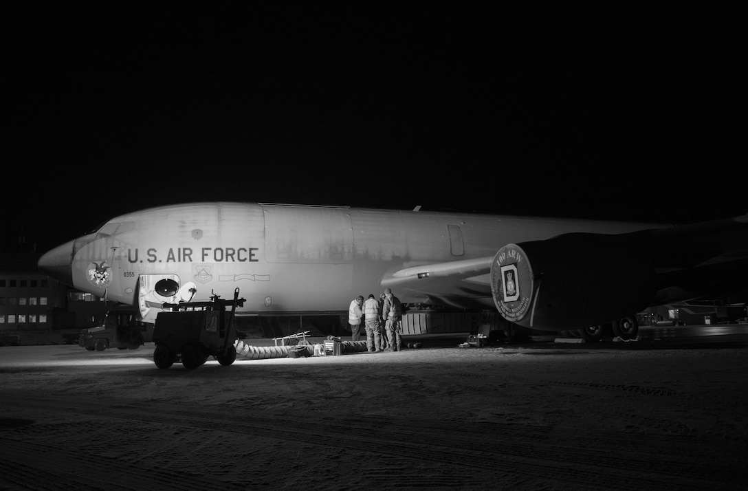 Crew chiefs from the 100th Aircraft Maintenance Squadron, RAF Mildenhall, England, conduct night maintenance during Exercise Trident Juncture 18, at Rovaniemi, Finland, Oct. 29, 2018. The exercise takes place in Norway and the surrounding areas of the North Atlantic and the Baltic Sea, including Iceland and the airspace of Finland and Sweden. With more than 50,000 participants, this is the largest NATO exercise since 2002. (U.S. Air Force photo by Senior Airman Luke Milano)