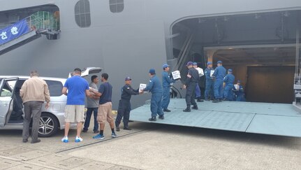 US Sailors share care packages with Japanese shipmates